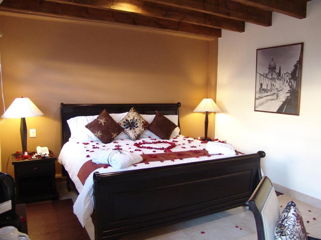 Casa Del Tio Hotel Boutique San Miguel de Allende Oda fotoğraf A bedroom at the Inn at the Quinta Real