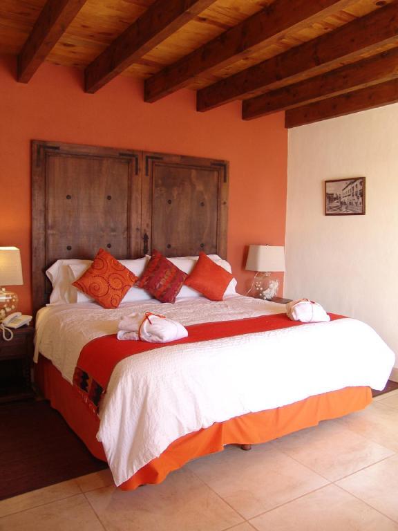 Casa Del Tio Hotel Boutique San Miguel de Allende Oda fotoğraf A bedroom at Hotel San Cristóbal