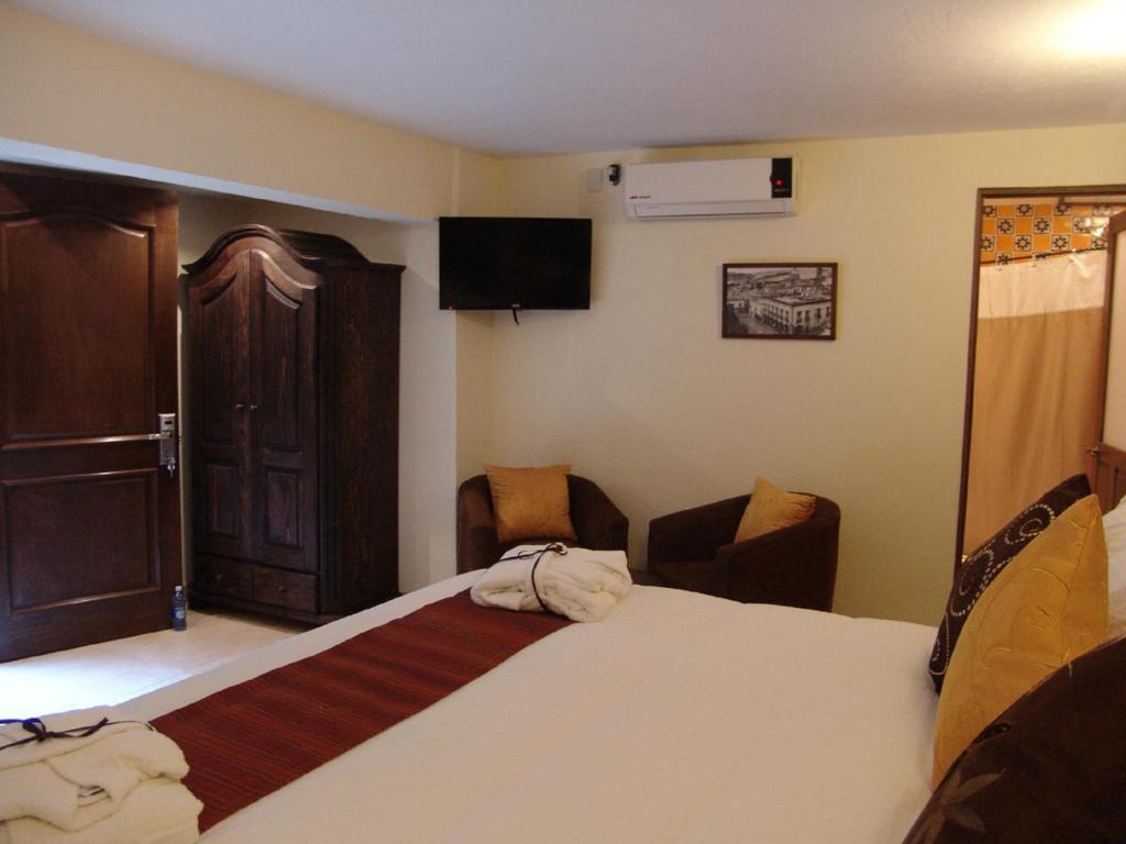 Casa Del Tio Hotel Boutique San Miguel de Allende Oda fotoğraf A room at the hotel